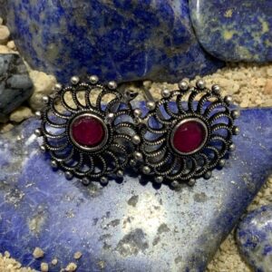 Decorative jewelry placed on colorful stones