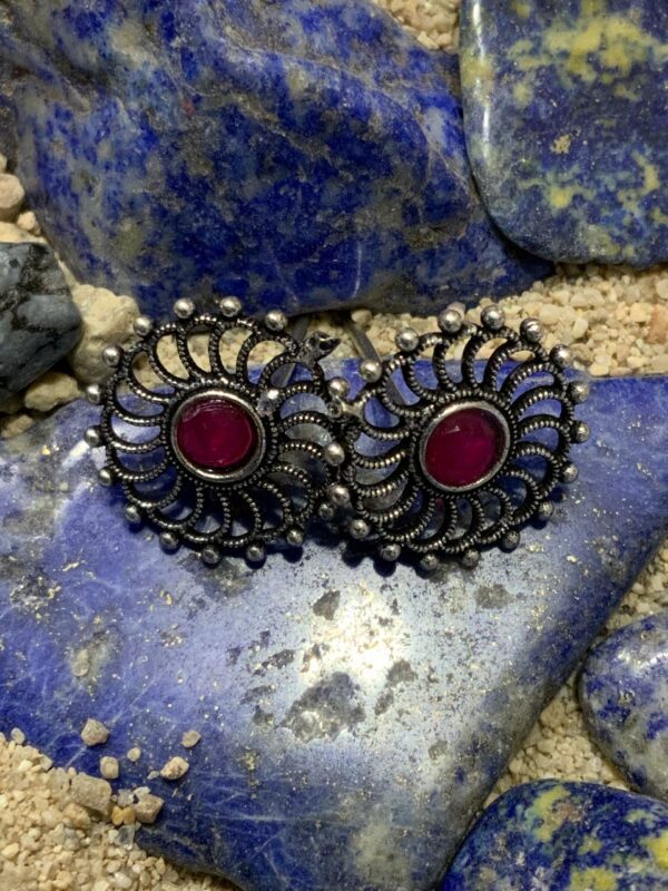 Decorative jewelry placed on colorful stones