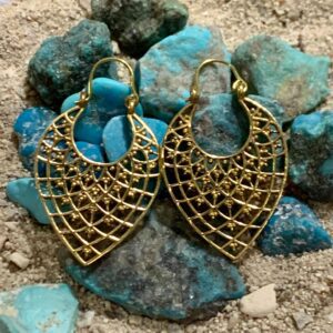 Gold earrings on turquoise stones