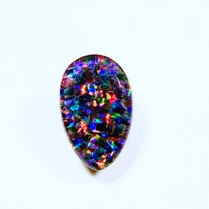 Colorful teardrop gemstone on white background