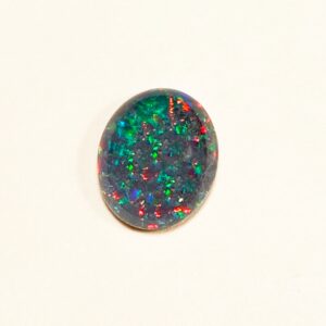 Oval opal gemstone with vibrant colors