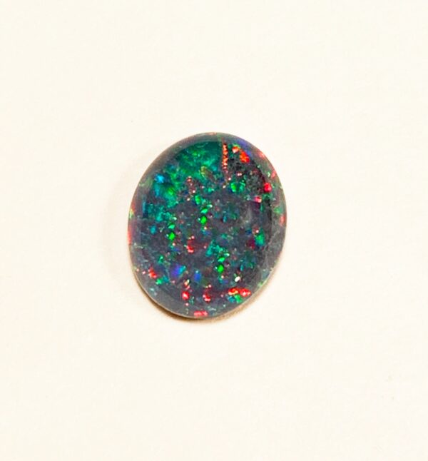 Oval opal gemstone with vibrant colors