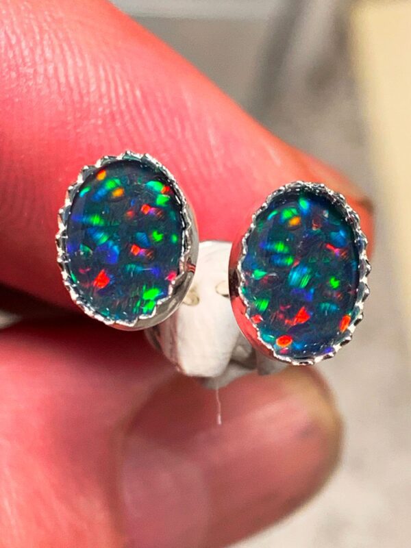 Colorful opal earrings in silver setting