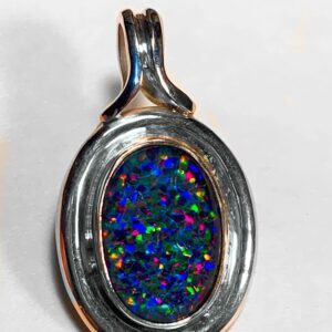 Vibrant opal pendant in silver setting