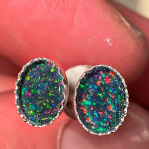 Iridescent opal earrings in silver setting