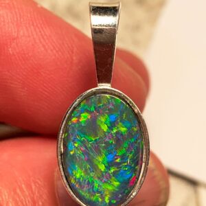 Close-up of opal gemstone pendant