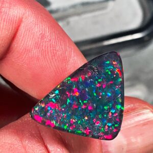 Iridescent triangular opal close-up