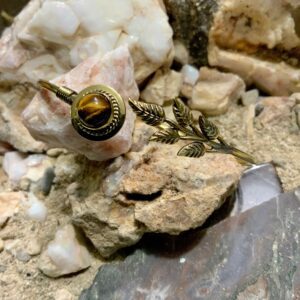 Gold rings on rocky surface