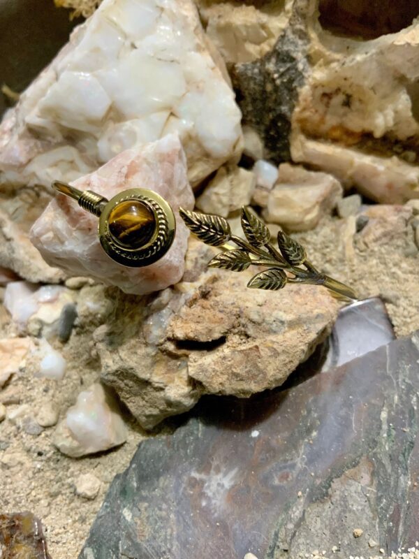 Gold rings on rocky surface