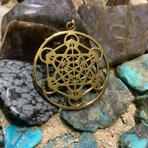Intricate pendant with geometric design on rocks