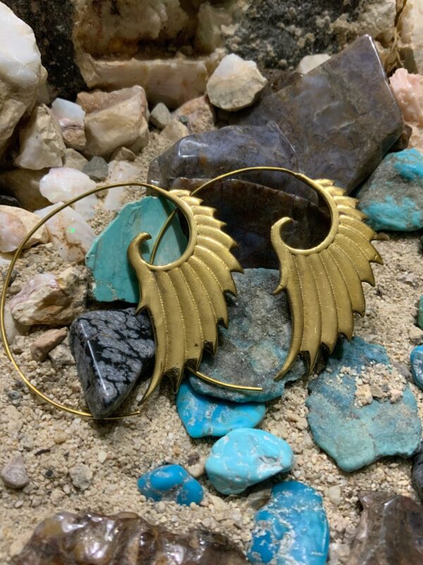 Golden wing earrings with turquoise rocks