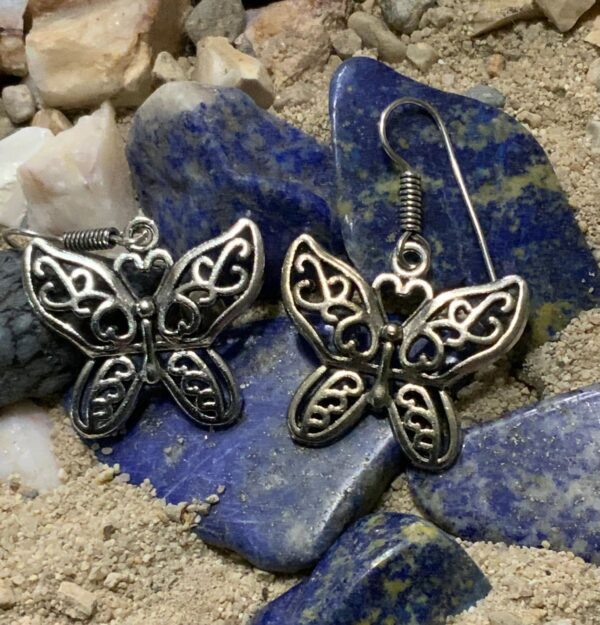 Intricate butterfly earrings with heart-shaped details