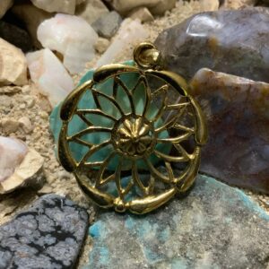 Intricate jewelry on rocky background