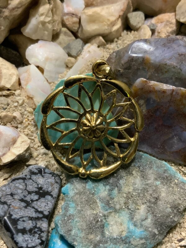 Intricate jewelry on rocky background
