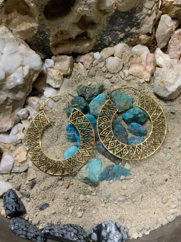 Intricate earrings with turquoise stones