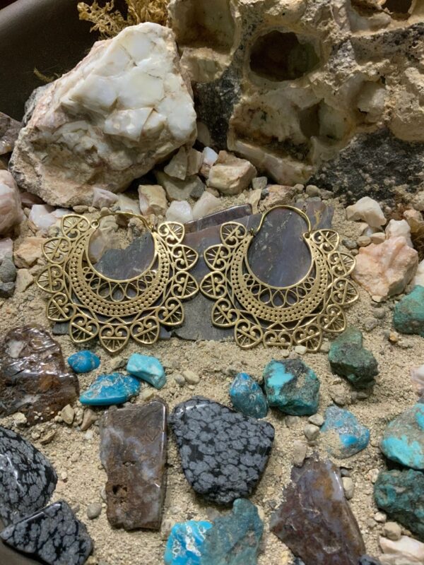 Earrings surrounded by colorful stones