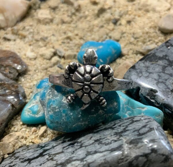 Turtle ring on turquoise stones