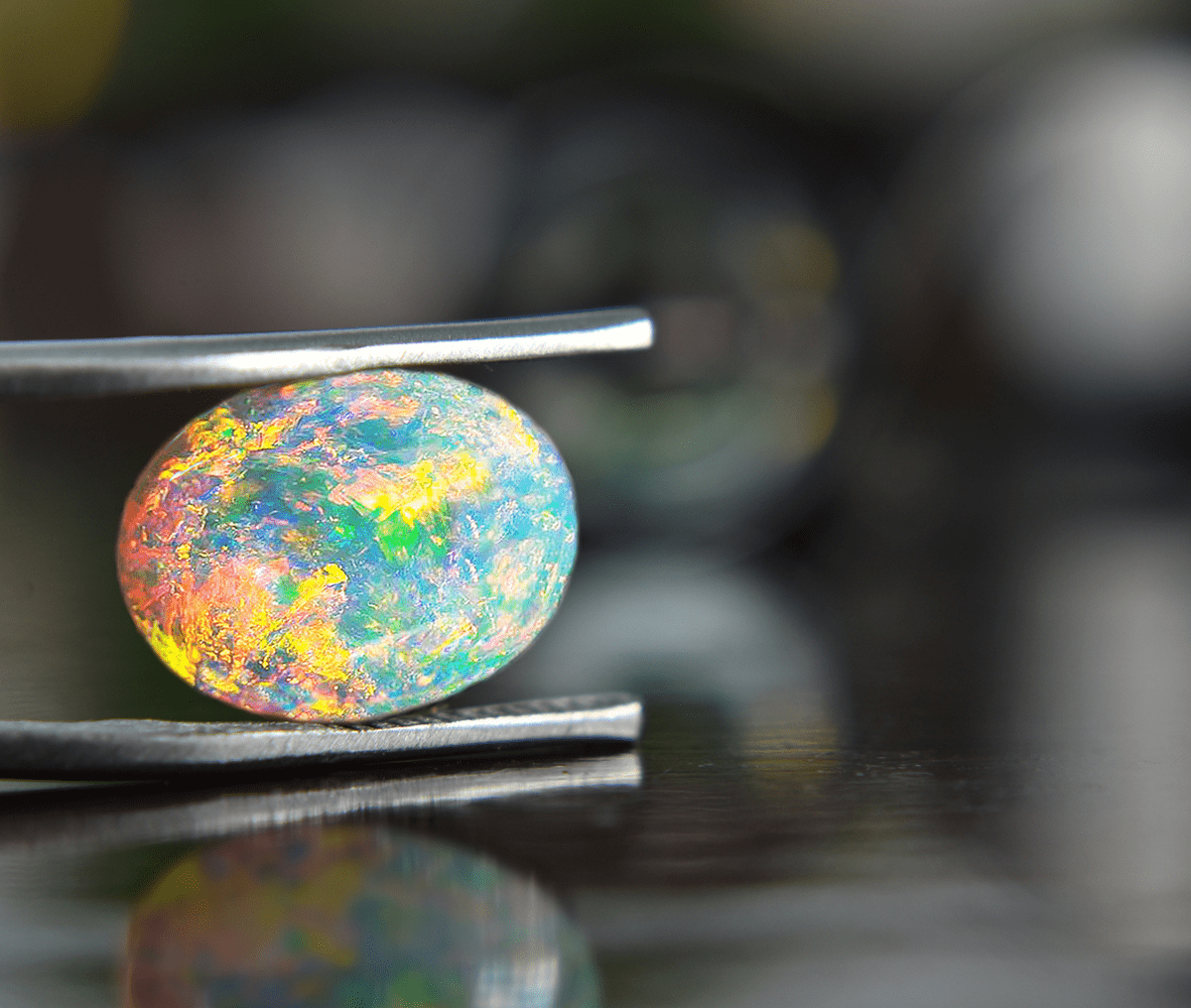 Multicolored opal in metal grip