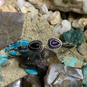 Silver bracelet with purple stones