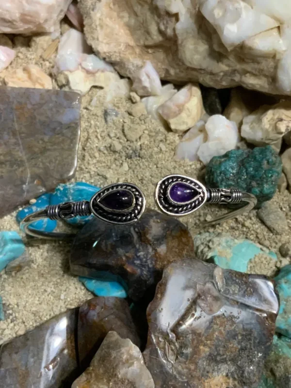 Silver bracelet with purple stones