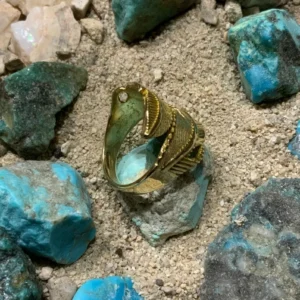 Gold ring on turquoise stones