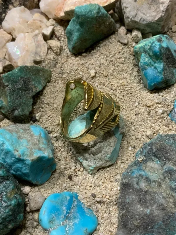 Gold ring on turquoise stones