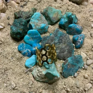 Hexagonal ring with blue gemstones