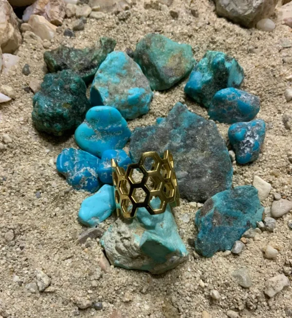 Hexagonal ring with blue gemstones