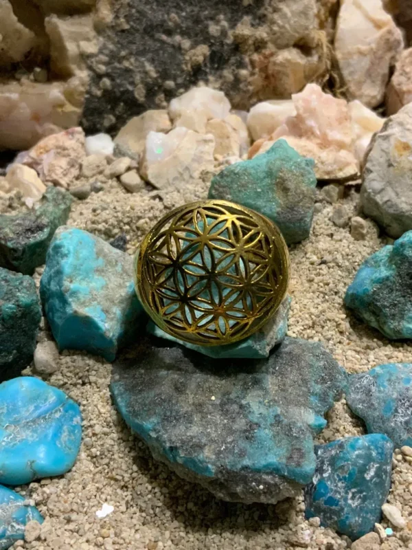 Intricate sphere among vibrant rocks